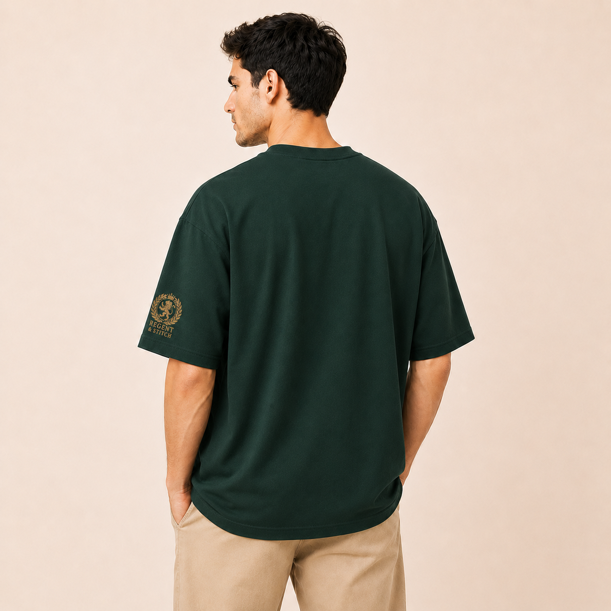 Dark green Regent & Stitch Greatness stitched limited edition T-shirt featuring embroidered design on front.