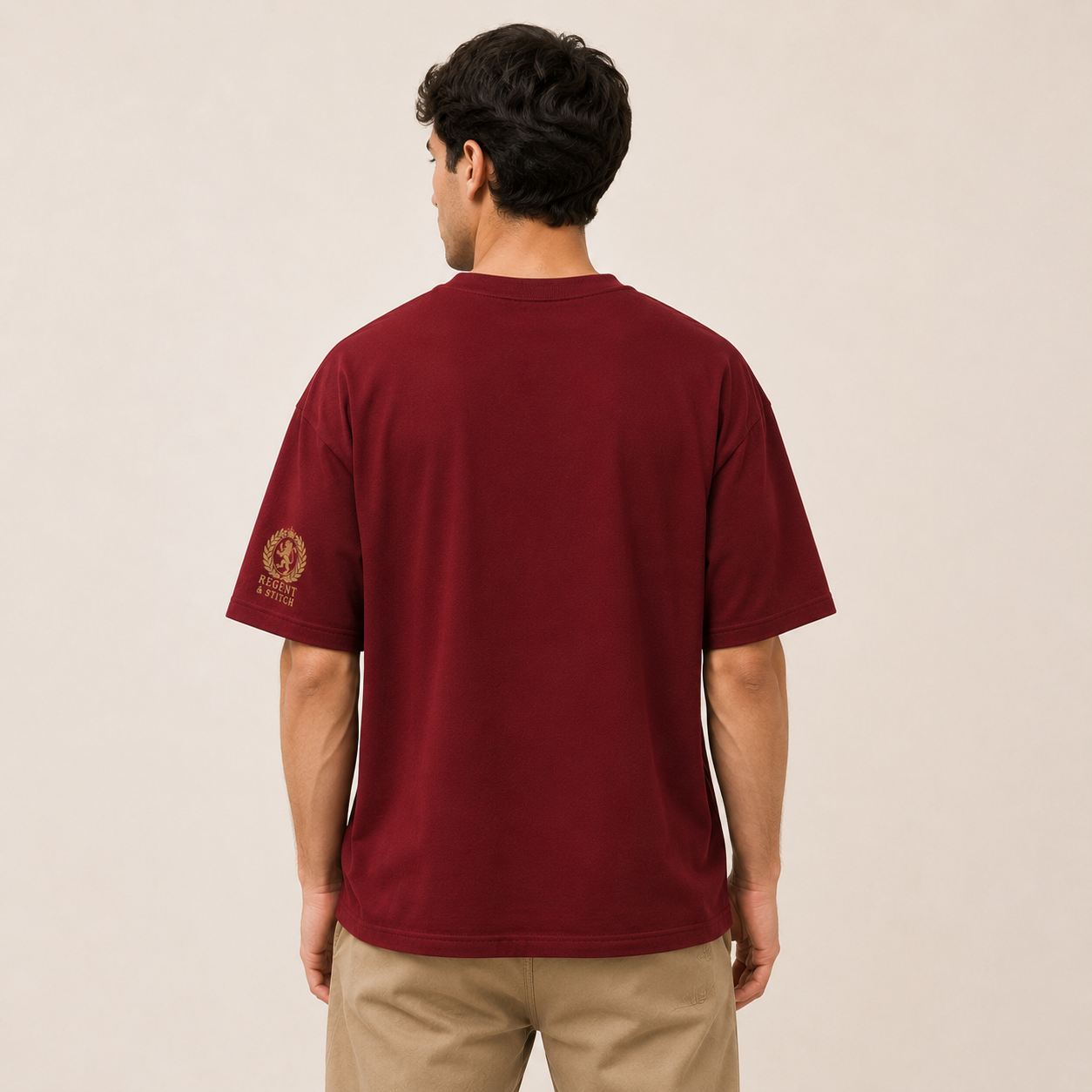 Red Regent & Stitch Greatness stitched limited edition T-shirt with maple leaf design displayed on a flat surface.
