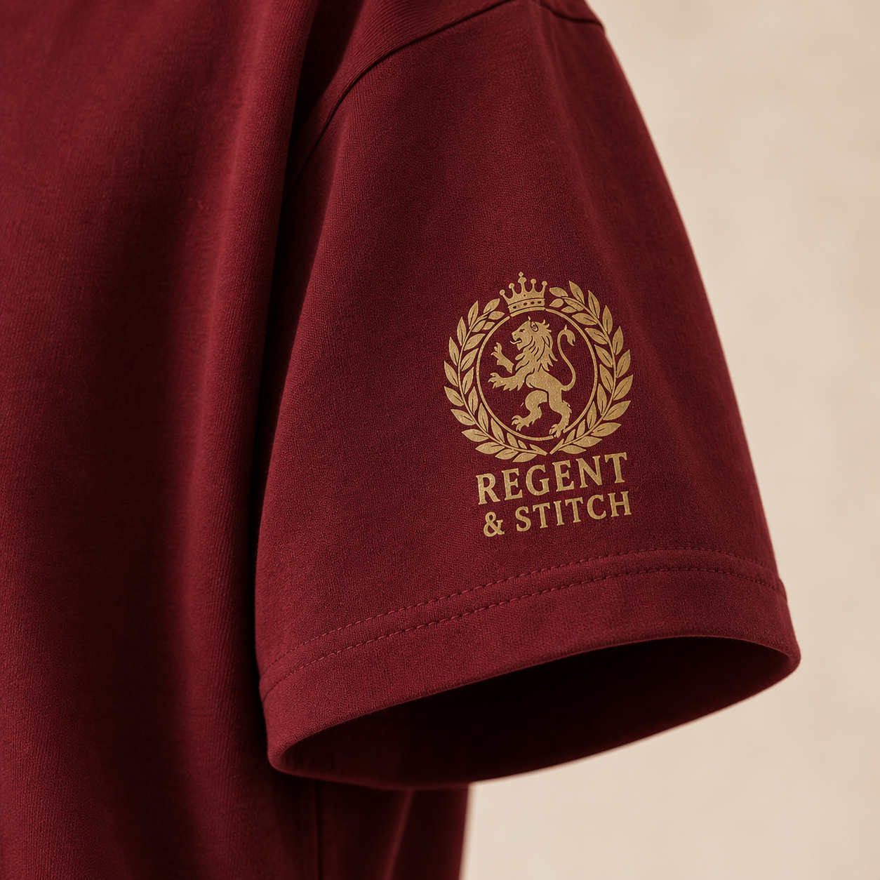 Regent & Stitch Greatness stitched limited edition T-shirt in maple leaf red, featuring a detailed embroidered design.