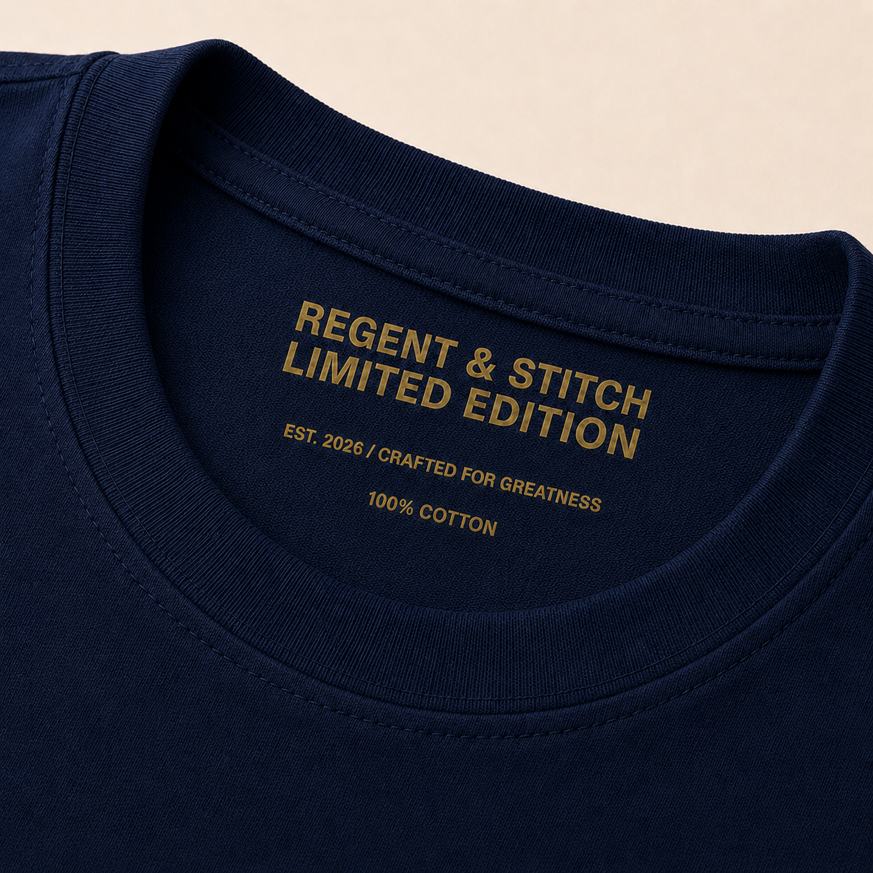 Navy blue Regent & Stitch Greatness stitched limited edition T-shirt with embroidered logo and detailed stitching on the front.